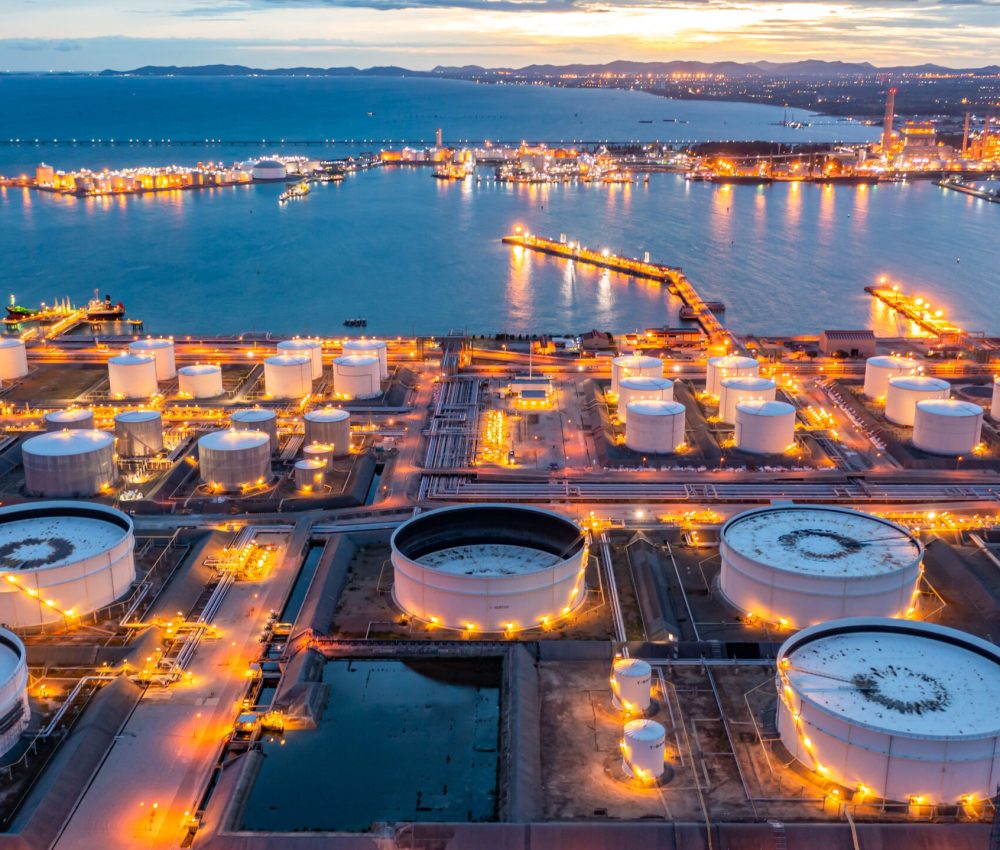 Aerial view oil terminal industrial facility storage tank oil and petrochemical product for transport to further storage facility, Storage tank petroleum petrochemical refinery product at oil terminal